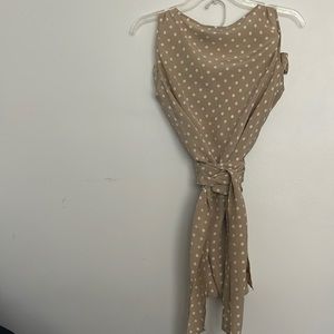 2 Piece never worn before wrap around top and skirt. Lining in skirt 100% silk.